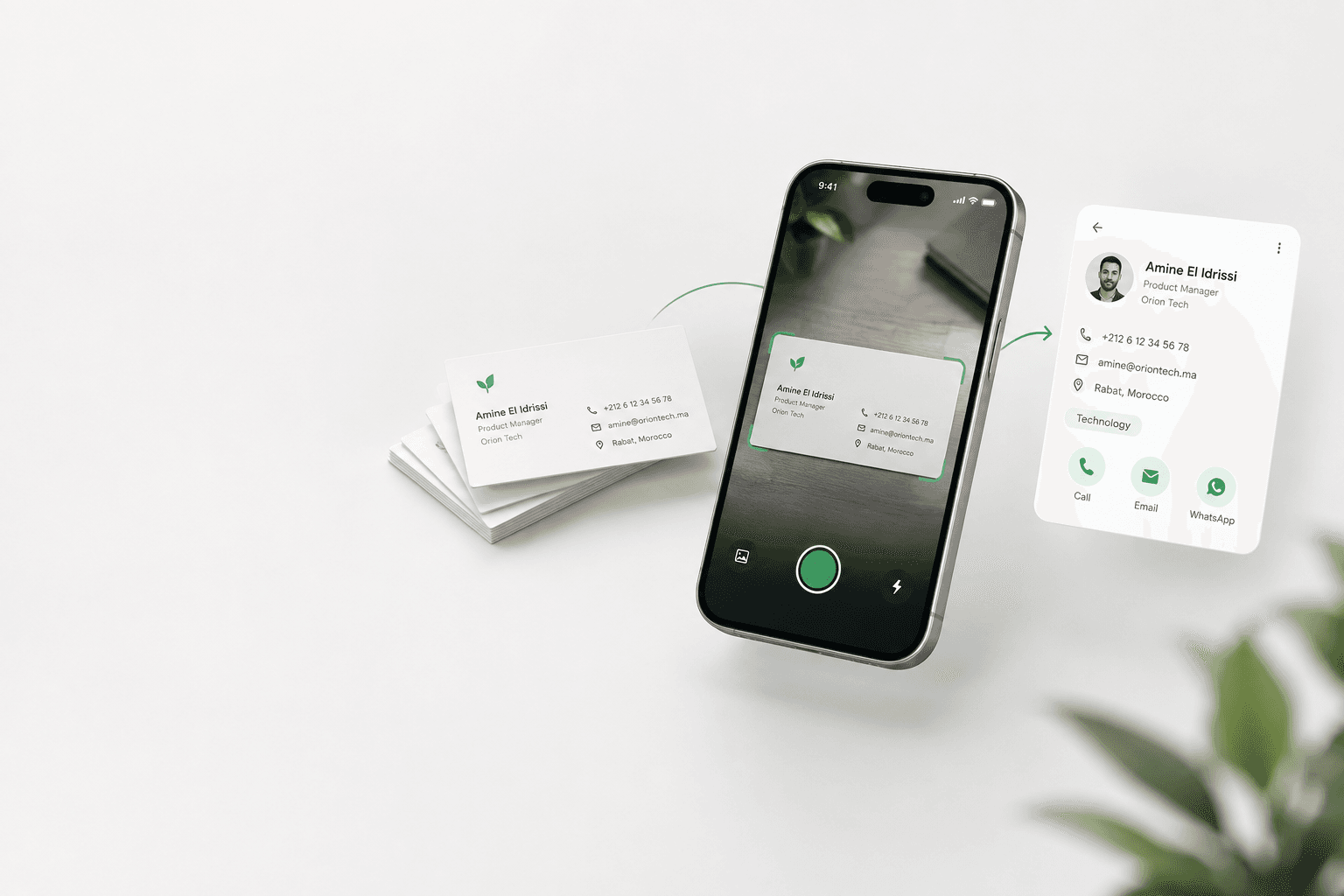 A phone camera scanning a physical business card and turning it into a structured contact with call, email, and WhatsApp actions