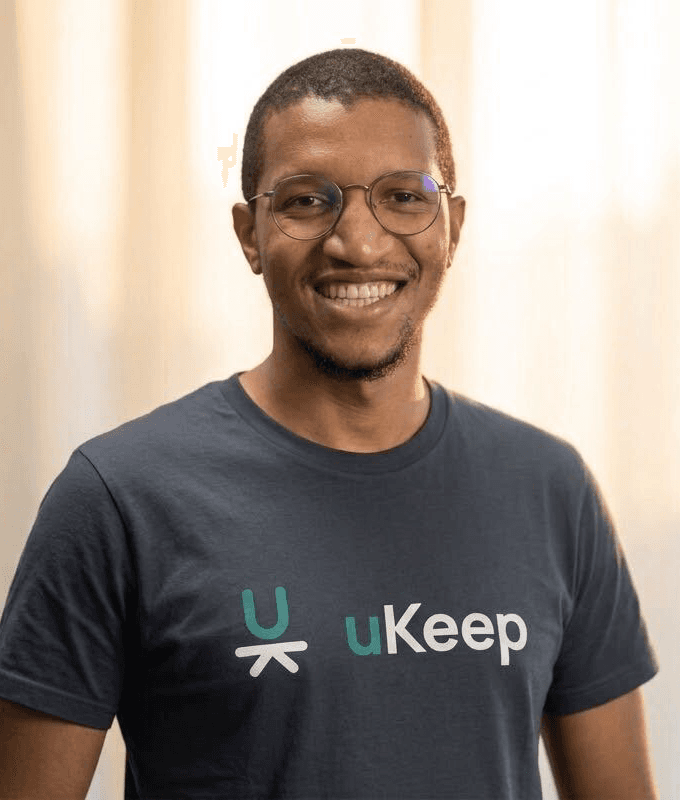 Abdessamade, co-founder of uKeep, wearing a uKeep t-shirt